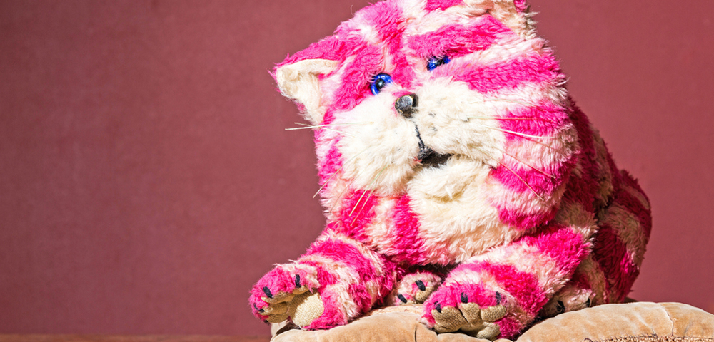 Bagpuss. A pink and white striped stuffed cat
