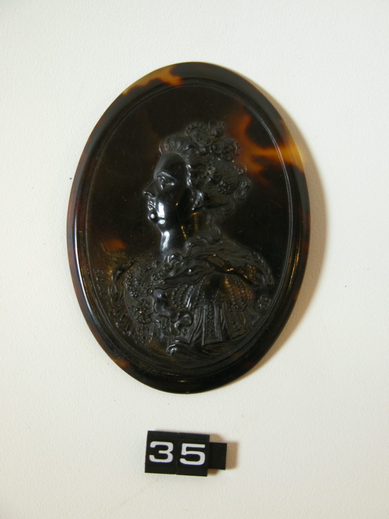 Oval medallion with portrait of Queen Anne