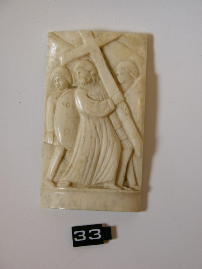 Bone or ivory carving of Jesus carrying his cross