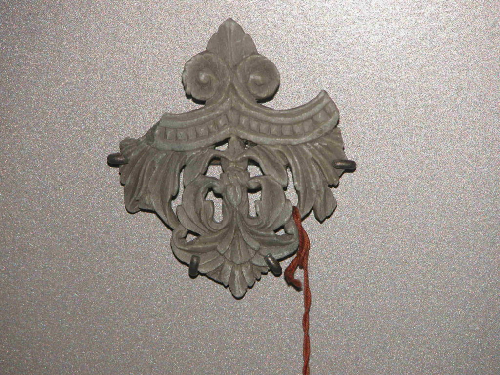 Carved escutcheon
