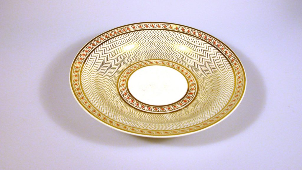 Plate with pink and gilded decoration