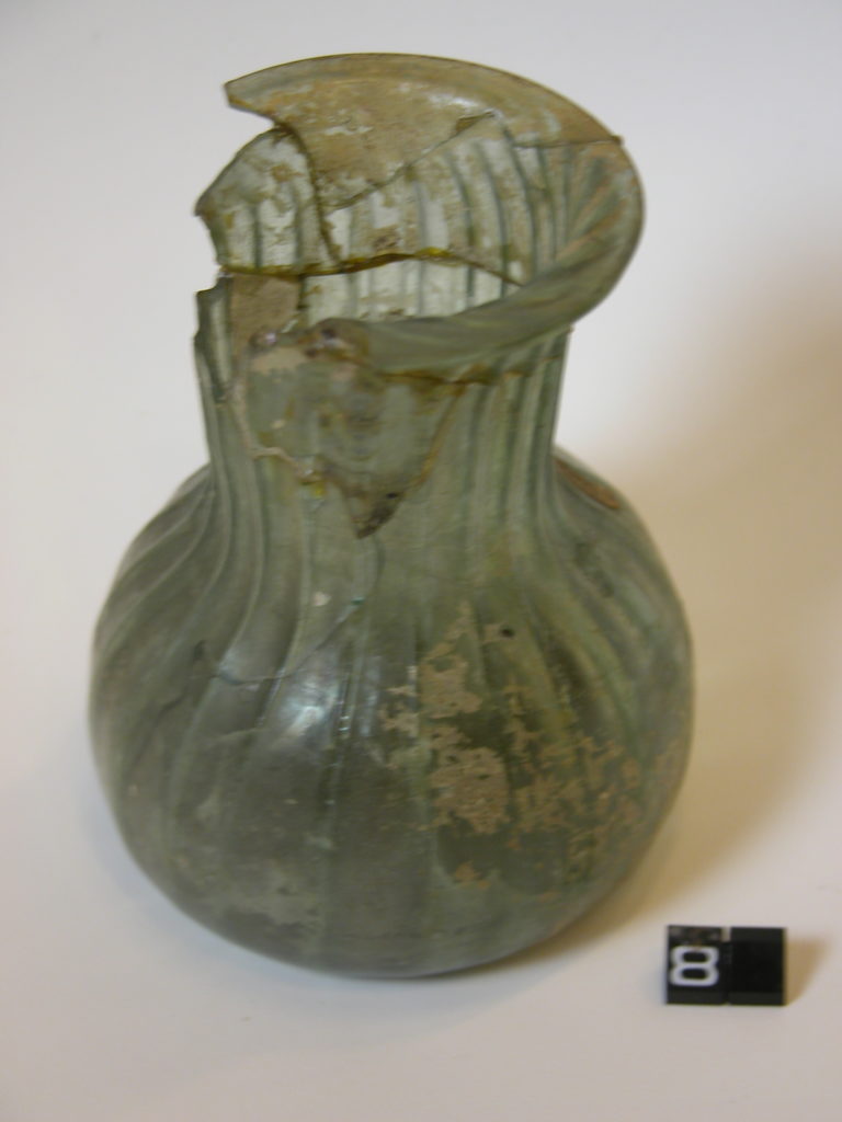 Roman vessel with ribbed sides and indented base
