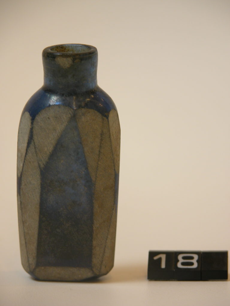 Dark blue bottle with ground bevelled edges