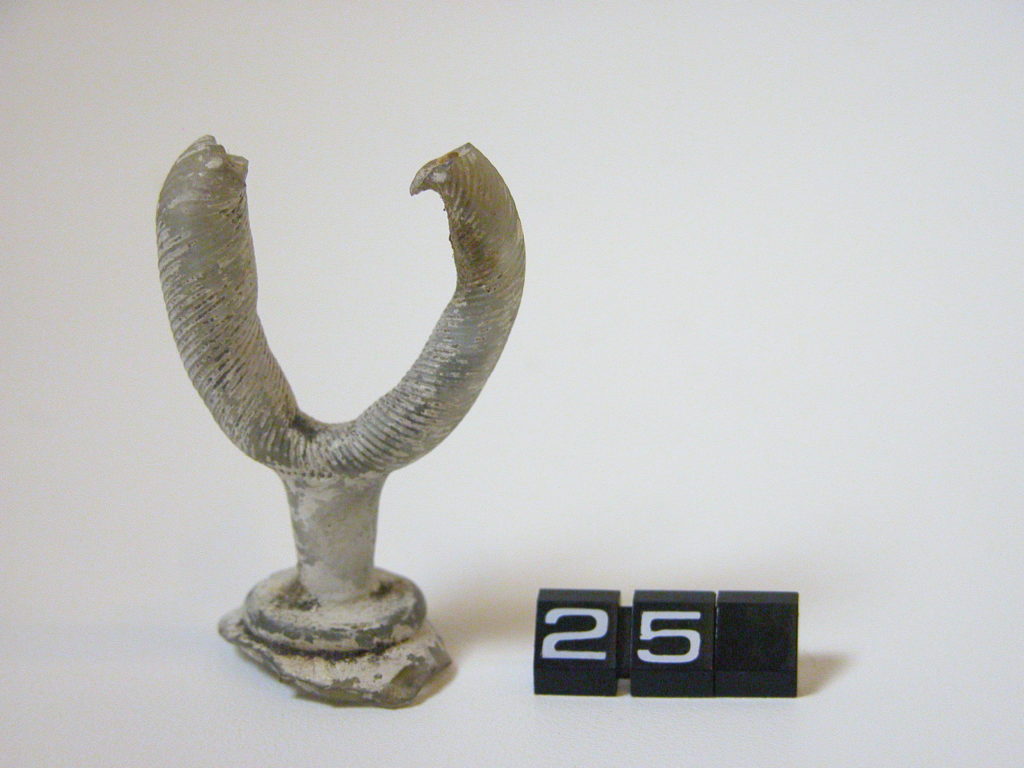 Stopper or dipper and decorative fragment