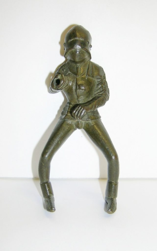 Figurine in a jousting pose