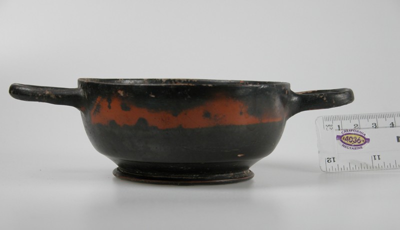 Shallow black and red bowl