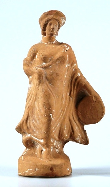 Draped female figure holding round instrument in left hand