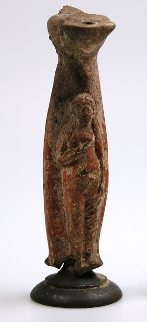 Lamp shaft in the form of a female holding her robe