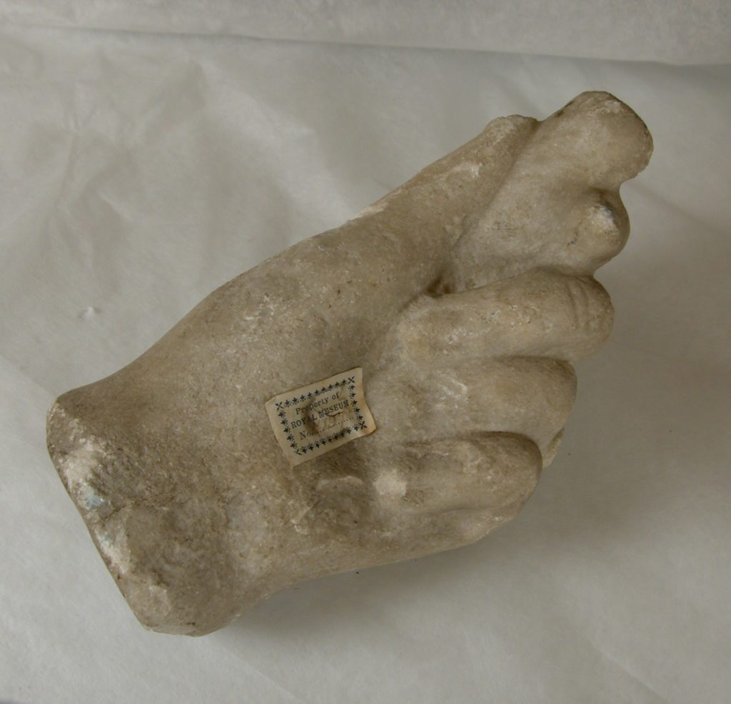 Hand with a scroll