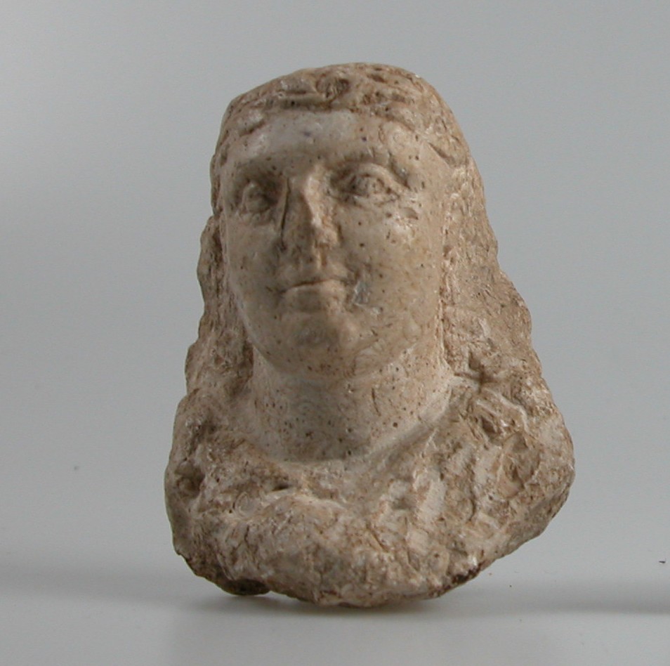 Head of a woman with a garland