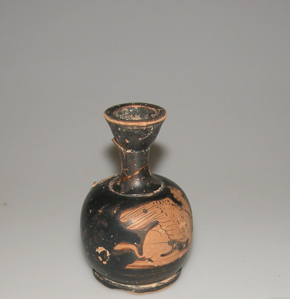 Vase with winged horse lying down