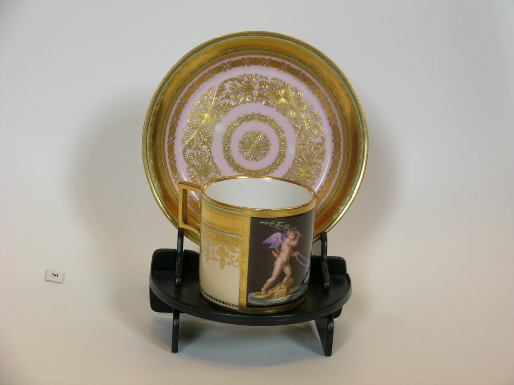 Coffee cup and saucer with gilded rim