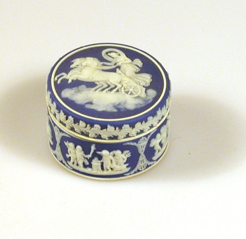 Pair of blue Jasperware pots with lids, decorated with classical scenes