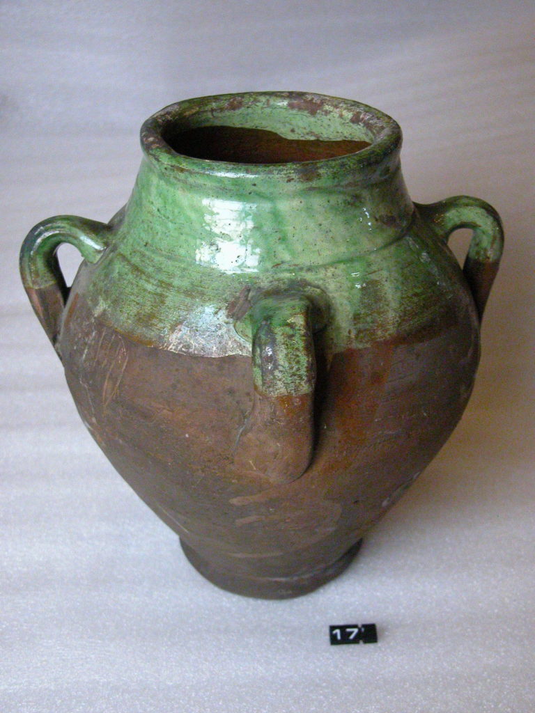 Green glazed red ware four handled vase