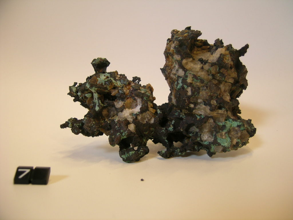 Native copper partly coated with Malachite