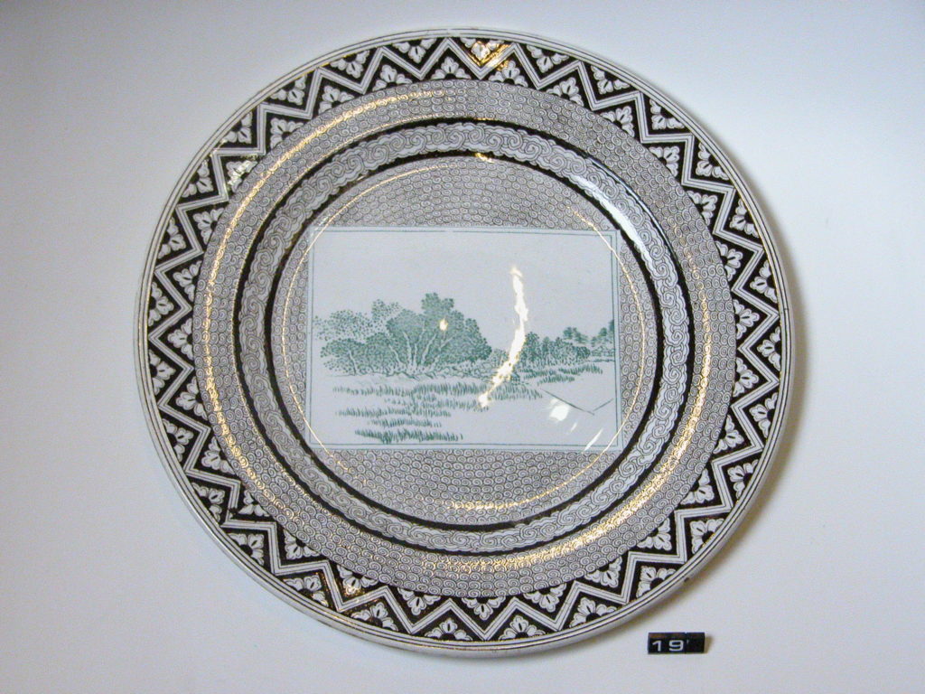 Plate with green and black  decoration