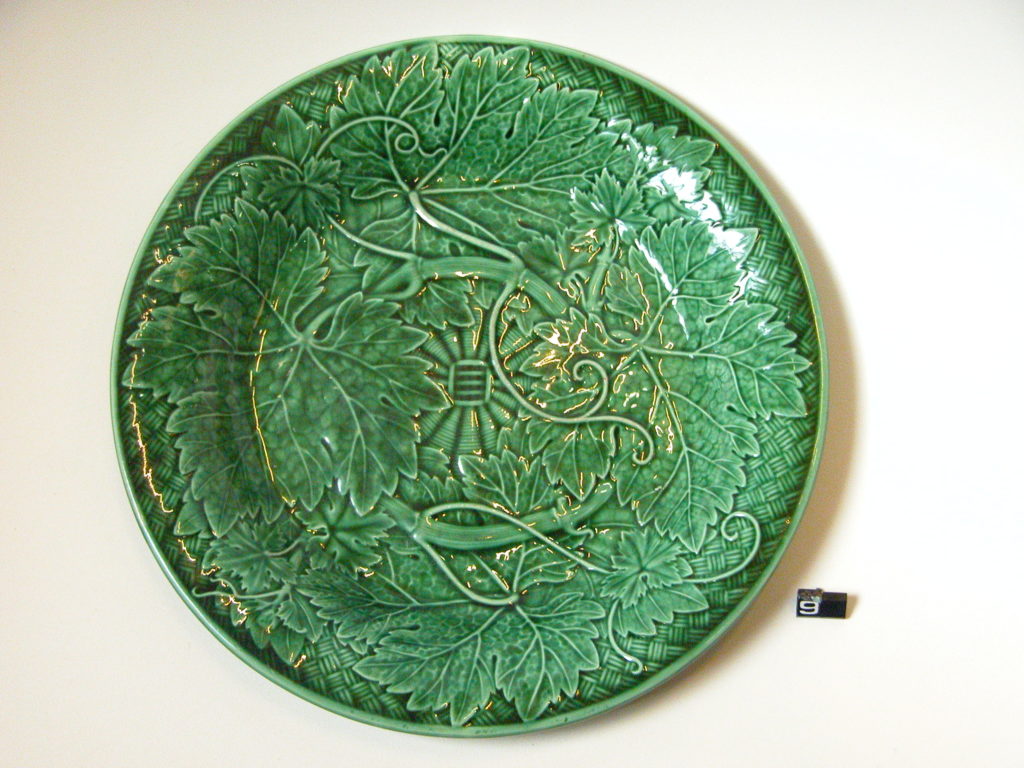 Green-glazed plate with vine leaves