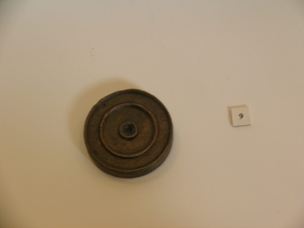 Round bronze and lead weight