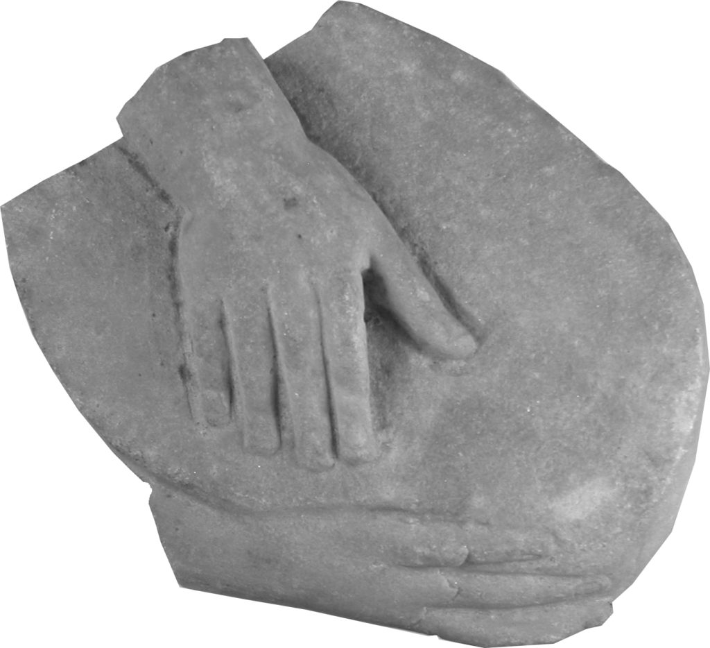 Sculptural fragment with hands holding a disc