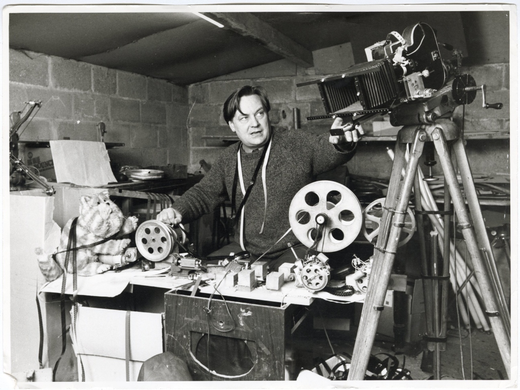 Oliver Postgate filming in his studio with Bagpuss